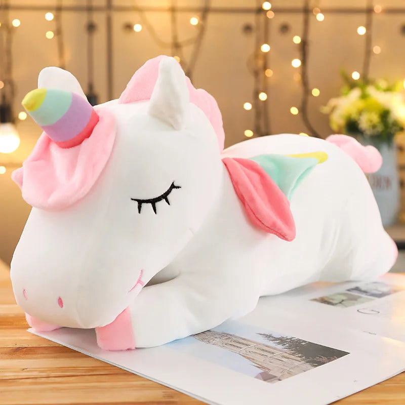 ピンクのふわふわ寝そべりユニコーンぬいぐるみ
