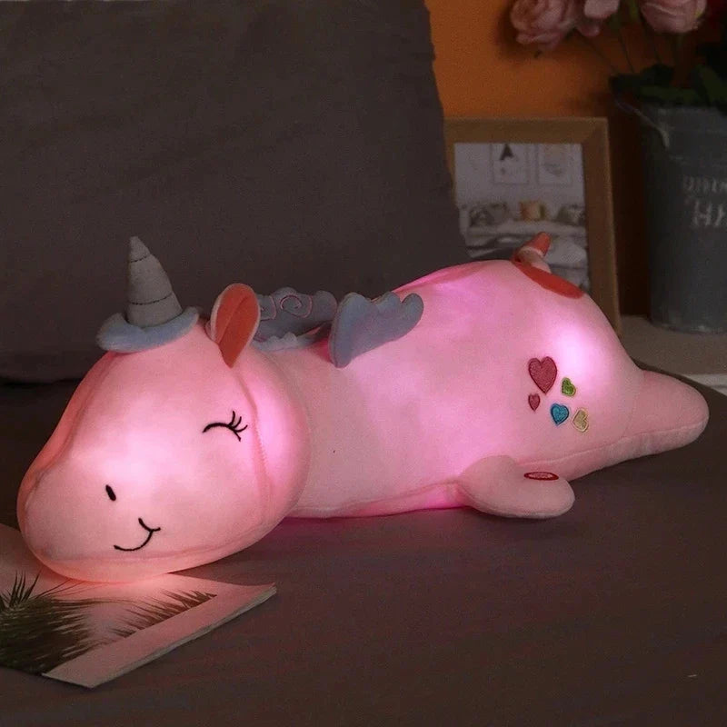 ピンクのユニコーンのぬいぐるみナイトライトと魔法