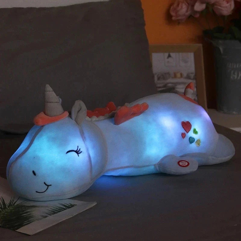 青いユニコーンのぬいぐるみのナイトライトと魔法