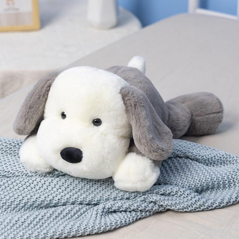 柔らかい灰色のぬいぐるみの犬
