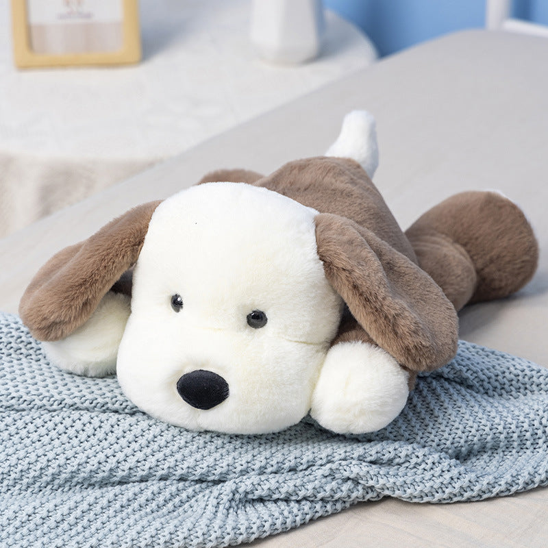 柔らかい茶色のぬいぐるみの犬