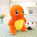 キラキラ輝くオレンジ色のヒトカゲのポケモンぬいぐるみ