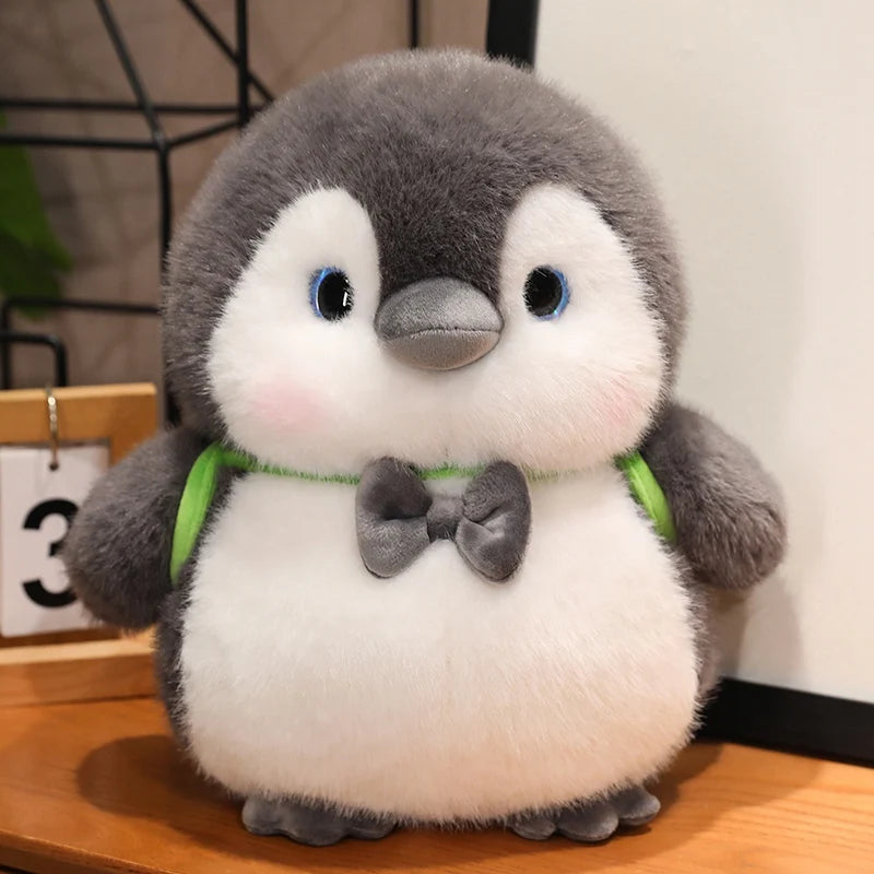 ふわふわ ぽっちゃり ピンク リボン の グレー ペンギン ぬいぐるみ
