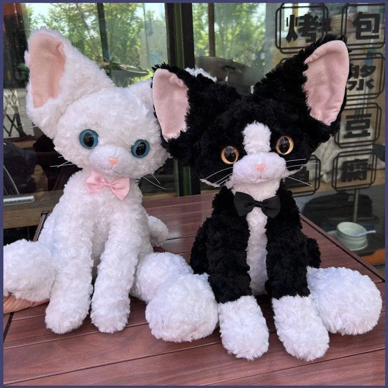 もこもこ耳長猫ぬいぐるみ 青い瞳とピンクのリボン