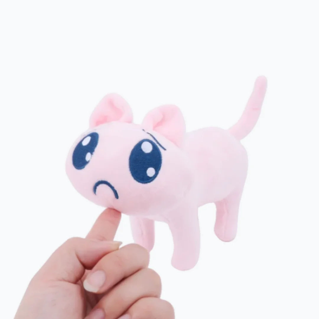 困り顔の薄ピンク猫ぬいぐるみ