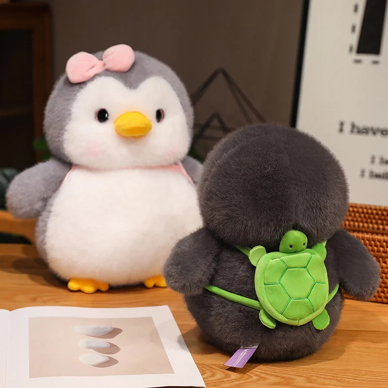 ふわふわ ぽっちゃり ピンク リボン の グレー ペンギン ぬいぐるみ
