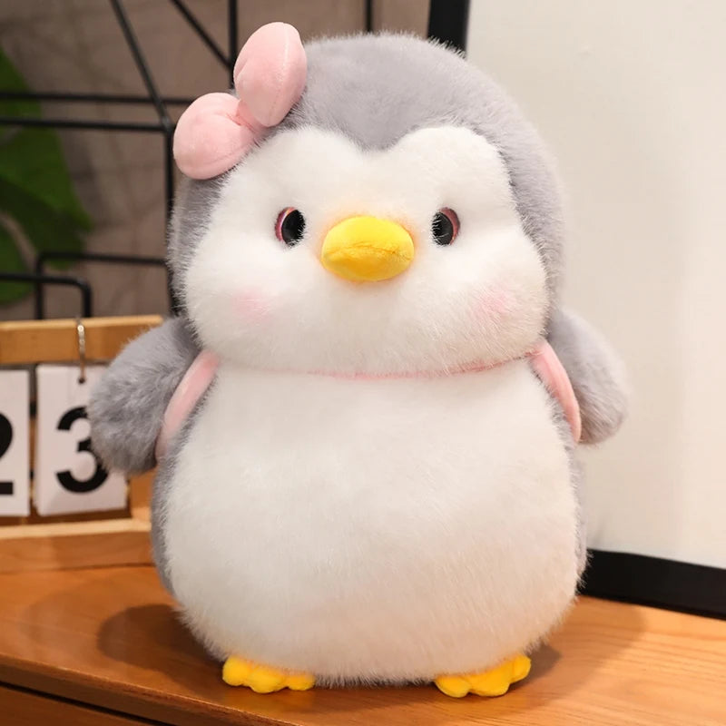 ふわふわ ぽっちゃり ピンク リボン の グレー ペンギン ぬいぐるみ