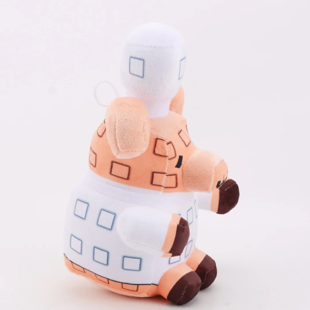 シェフ帽をかぶったワッフル豚のブロック風ぬいぐるみ