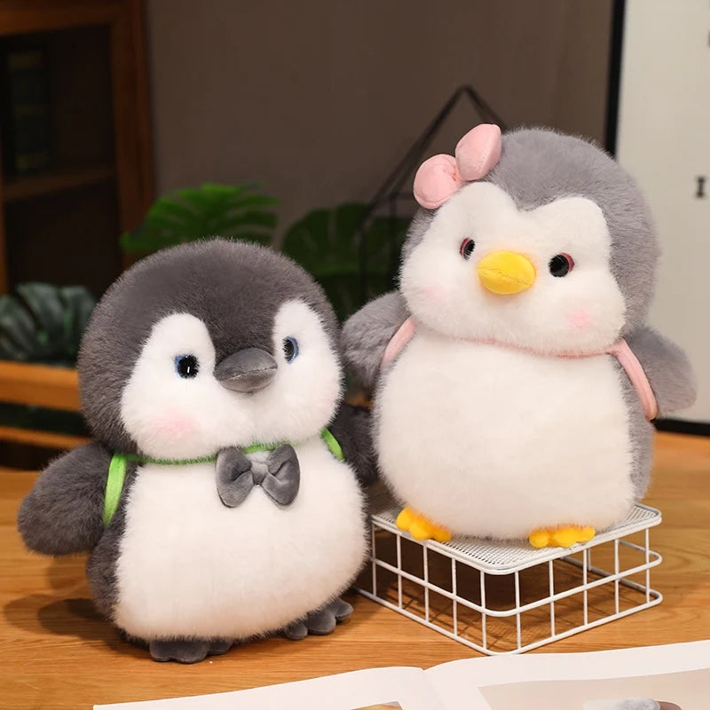 ふわふわ ぽっちゃり ピンク リボン の グレー ペンギン ぬいぐるみ