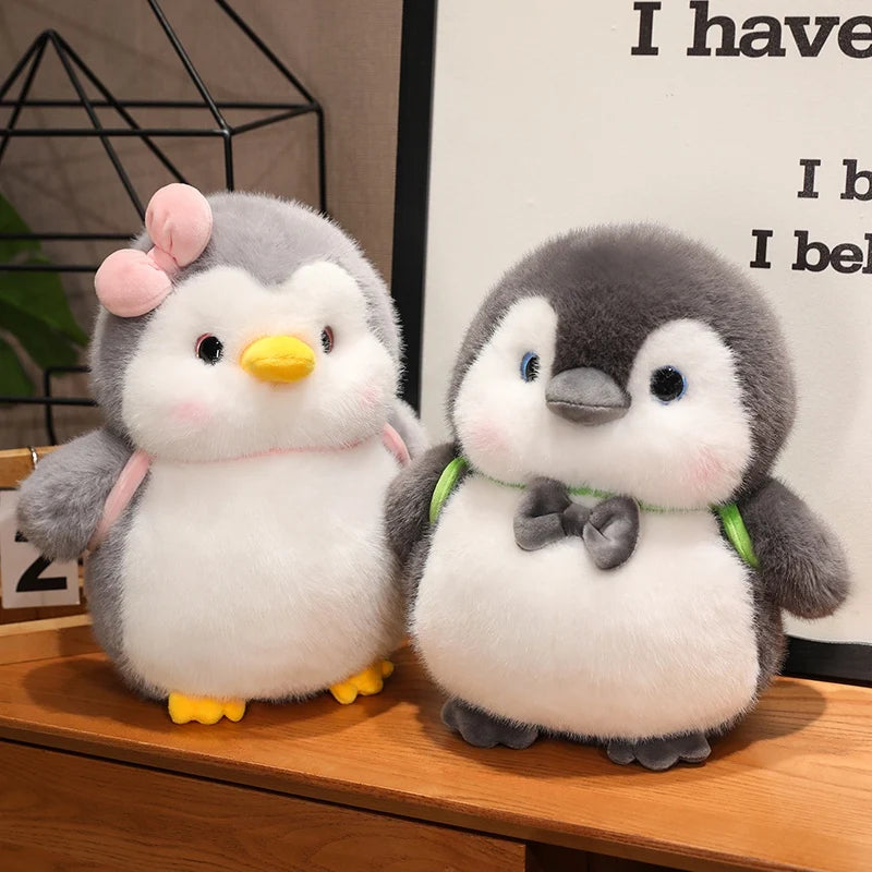 ふわふわ ぽっちゃり ピンク リボン の グレー ペンギン ぬいぐるみ