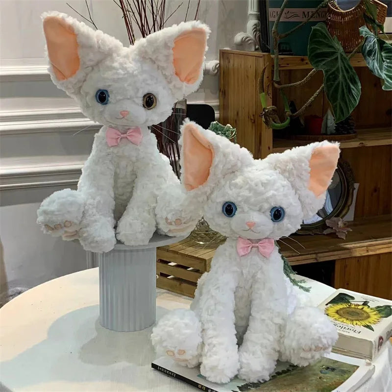 もこもこ耳長猫ぬいぐるみ 青い瞳とピンクのリボン