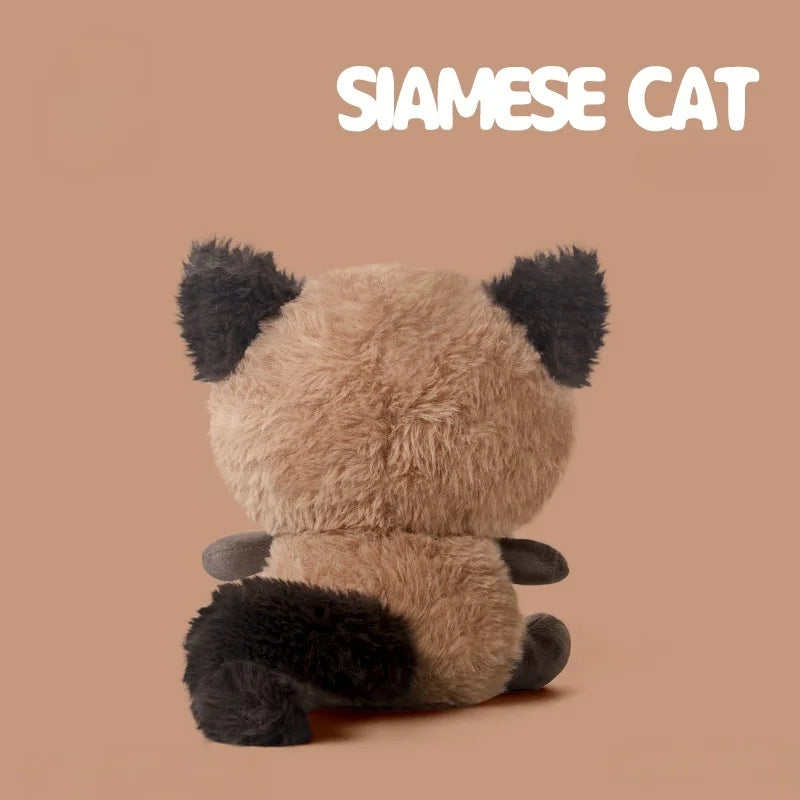 かわいい青い目のふわふわシャム猫ぬいぐるみ