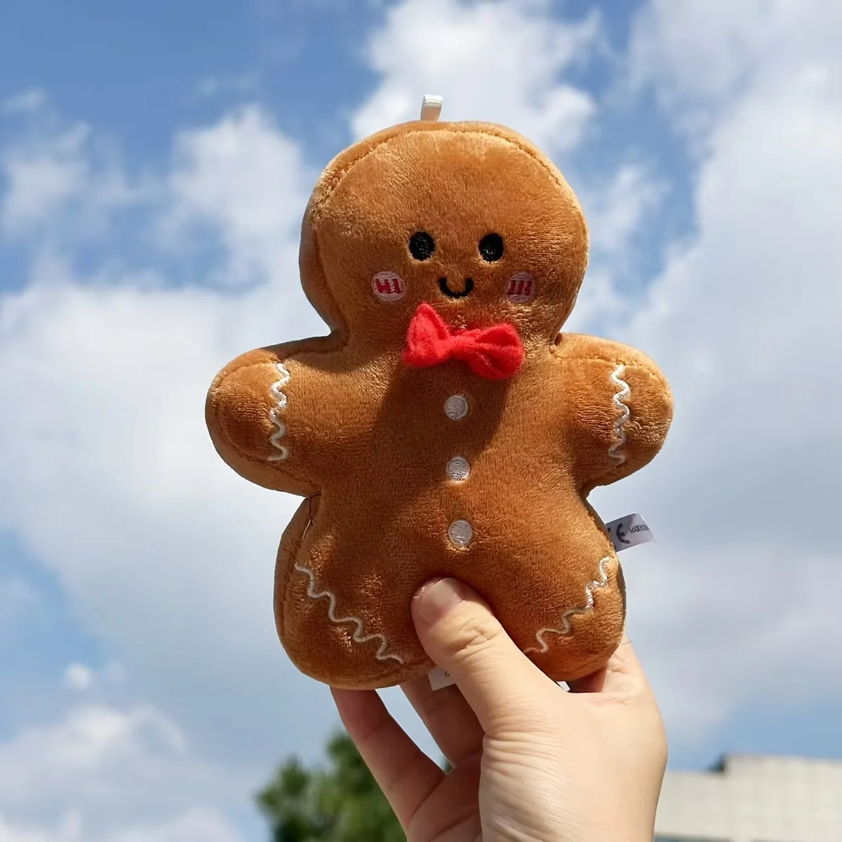 かわいい ジンジャーブレッドマン ぬいぐるみ 赤い蝶ネクタイ 吊り下げループ付き