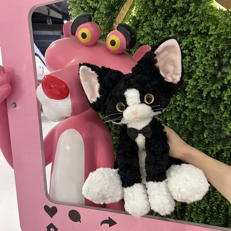 もこもこ耳長猫ぬいぐるみ 青い瞳とピンクのリボン