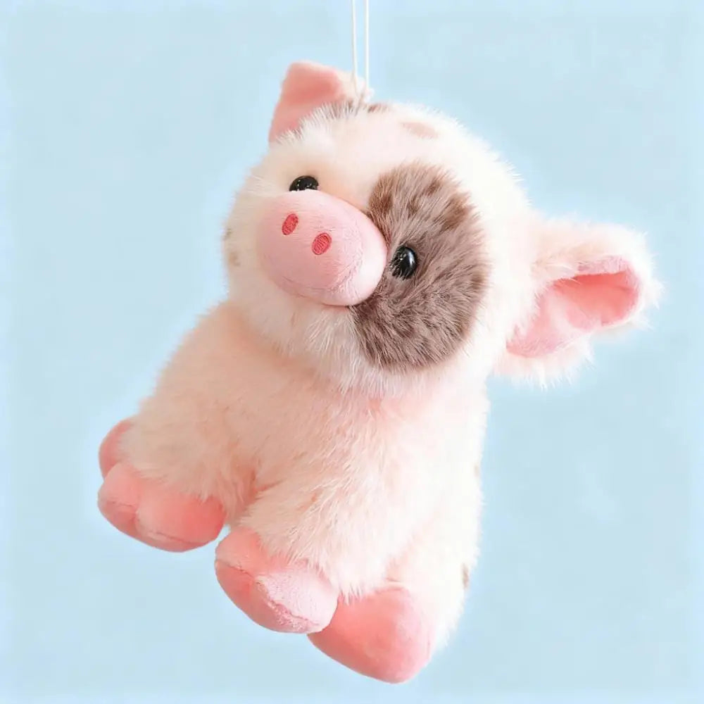 茶色いブチ豚のふわふわぬいぐるみ