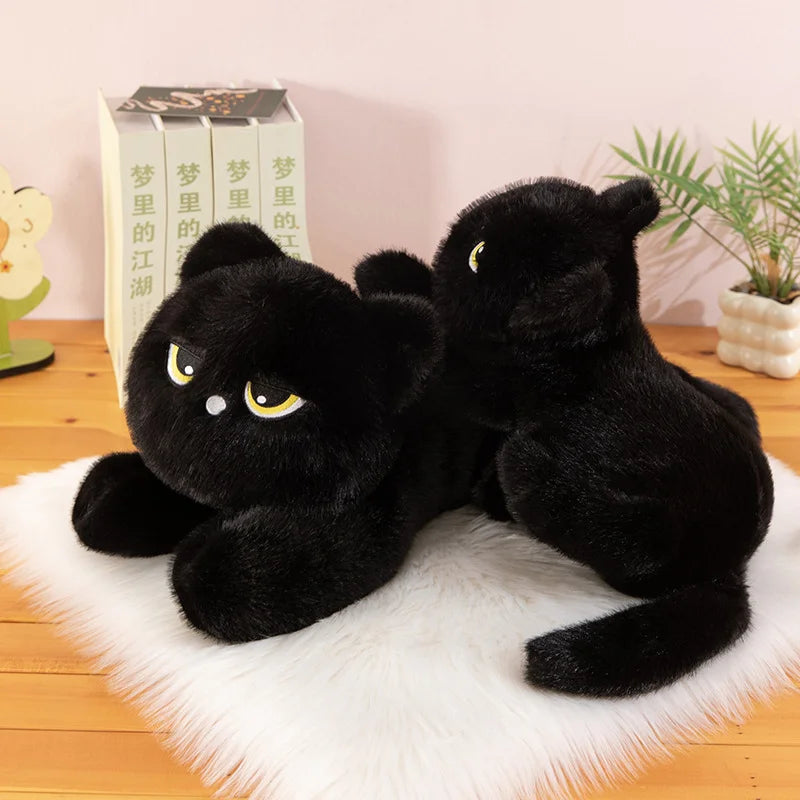 不機嫌な黒猫の寝そべりぬいぐるみ