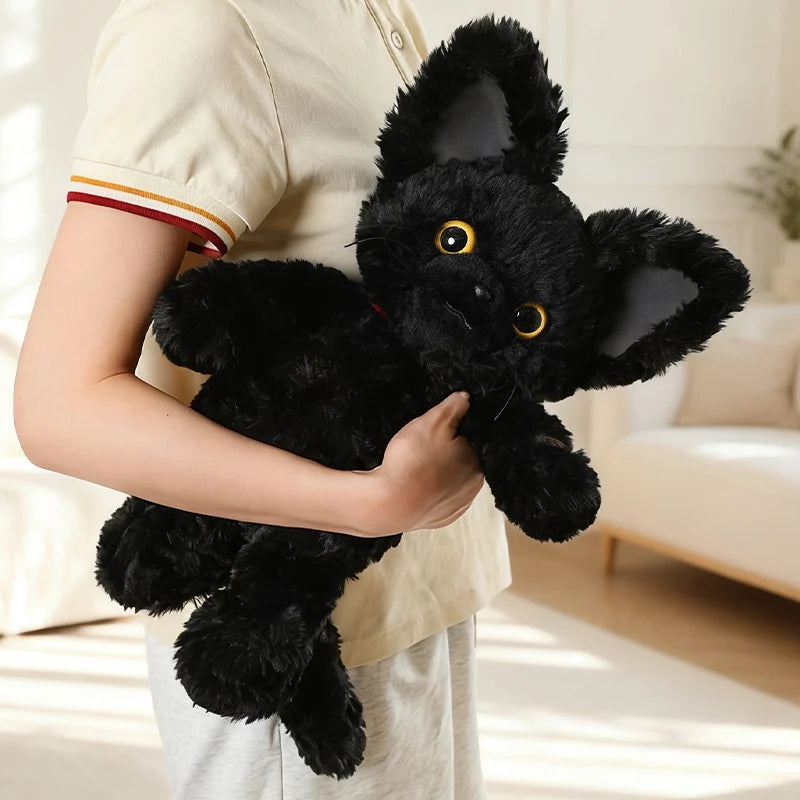 赤い首輪と黄色い目のふわふわ黒猫ぬいぐるみ