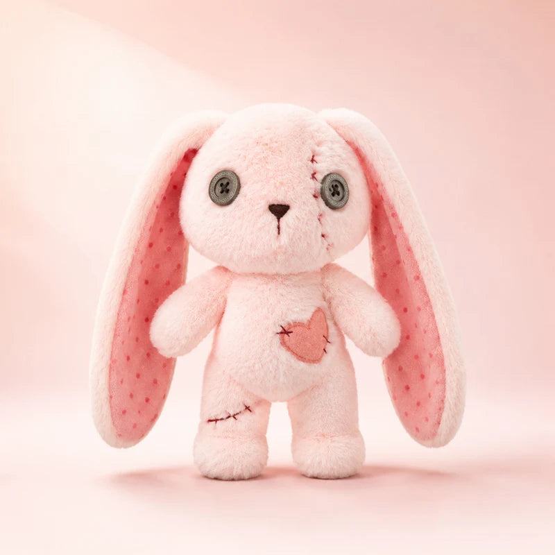 傷ついたハートのボタン目うさぎぬいぐるみ