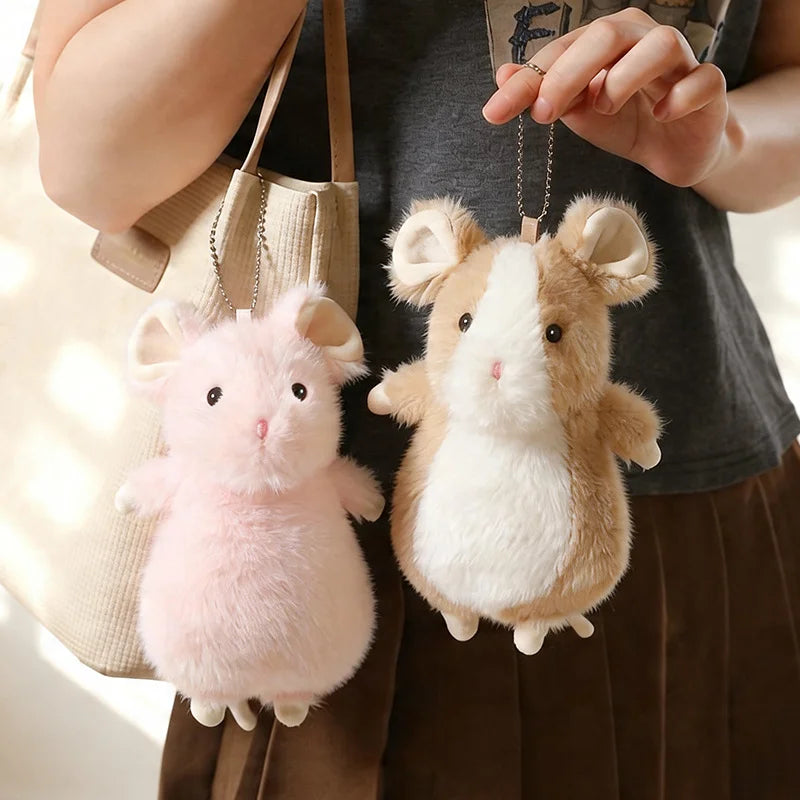 ふわふわでかわいいパステルカラーのハムスターぬいぐるみ