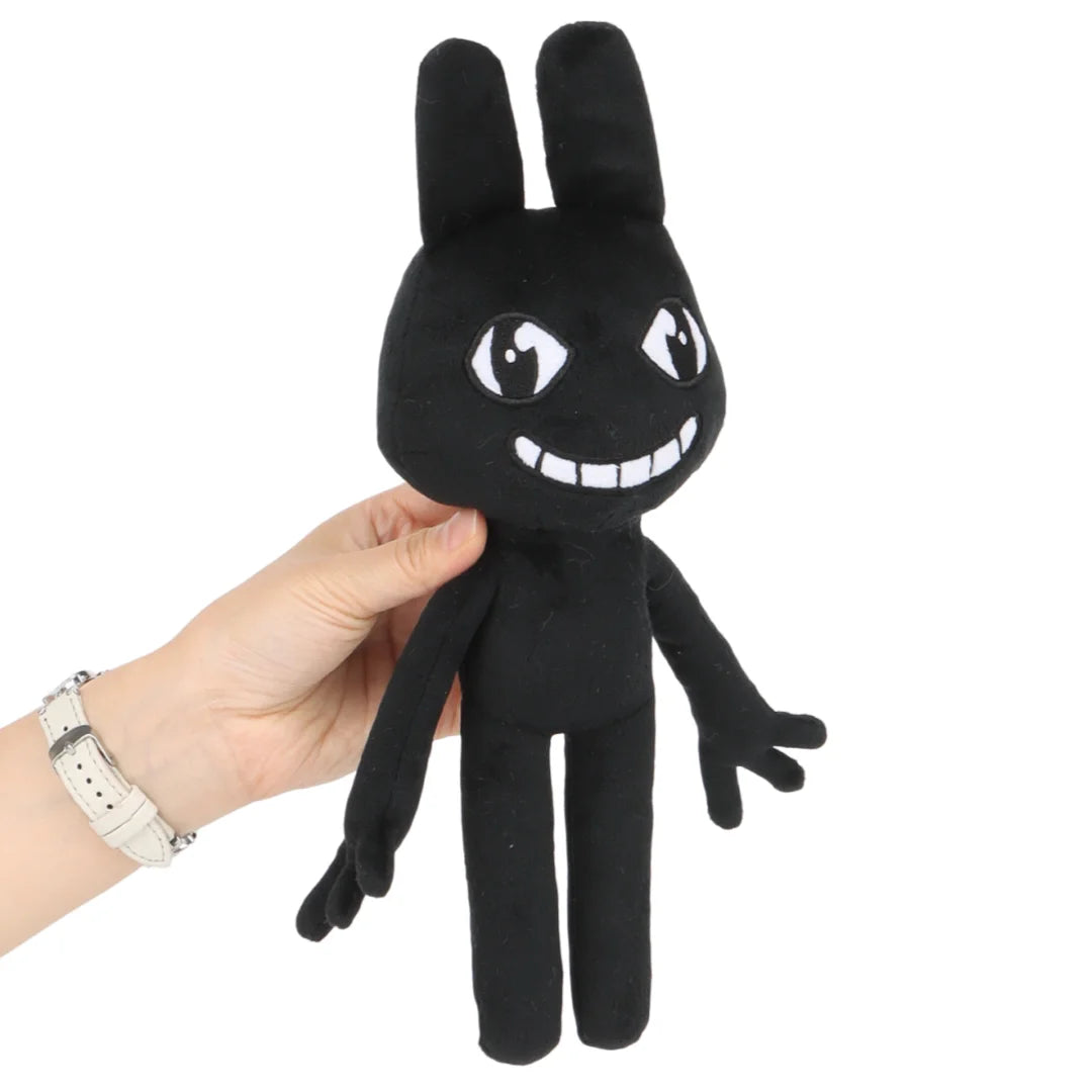 不気味かわいい黒いウサギの笑顔ぬいぐるみ