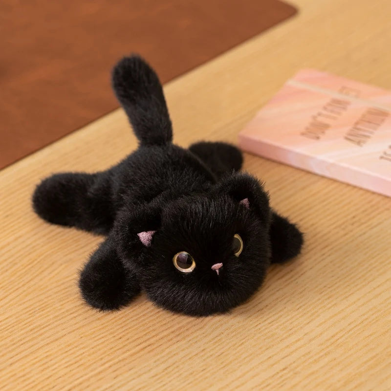 大きな目の重ね猫 ぬいぐるみ 黒と茶白