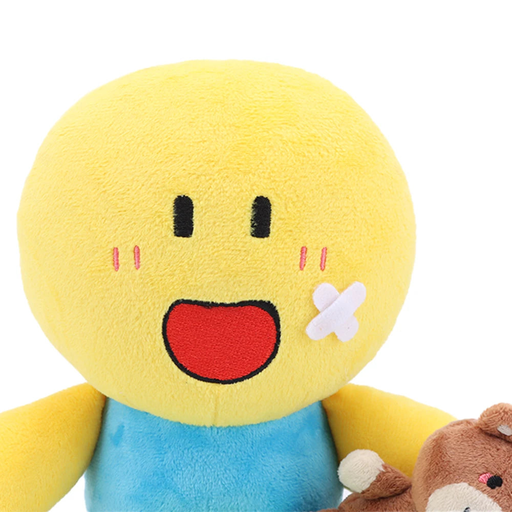 ポップな絆創膏付き 黄色い丸顔 ぬいぐるみ