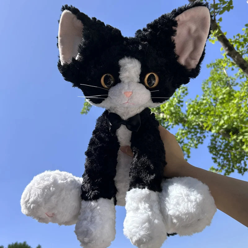 もこもこ耳長猫ぬいぐるみ 青い瞳とピンクのリボン