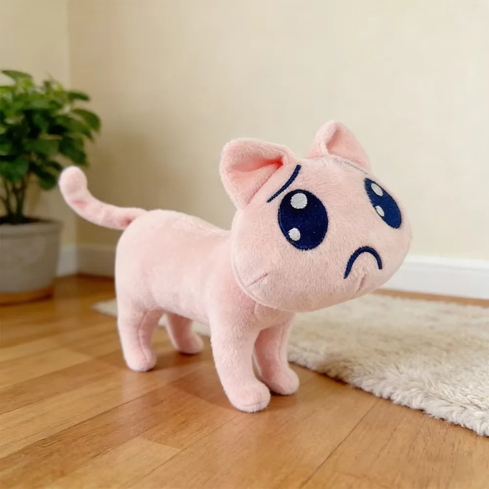 ふわふわなピンクの困り顔ネコぬいぐるみ
