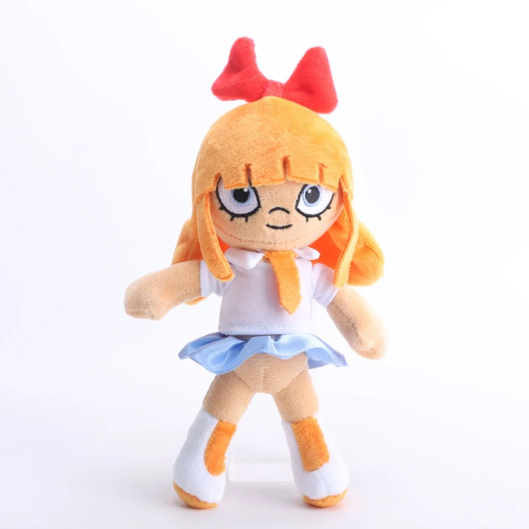 赤いリボンと青い目のオレンジ髪の女の子ぬいぐるみ
