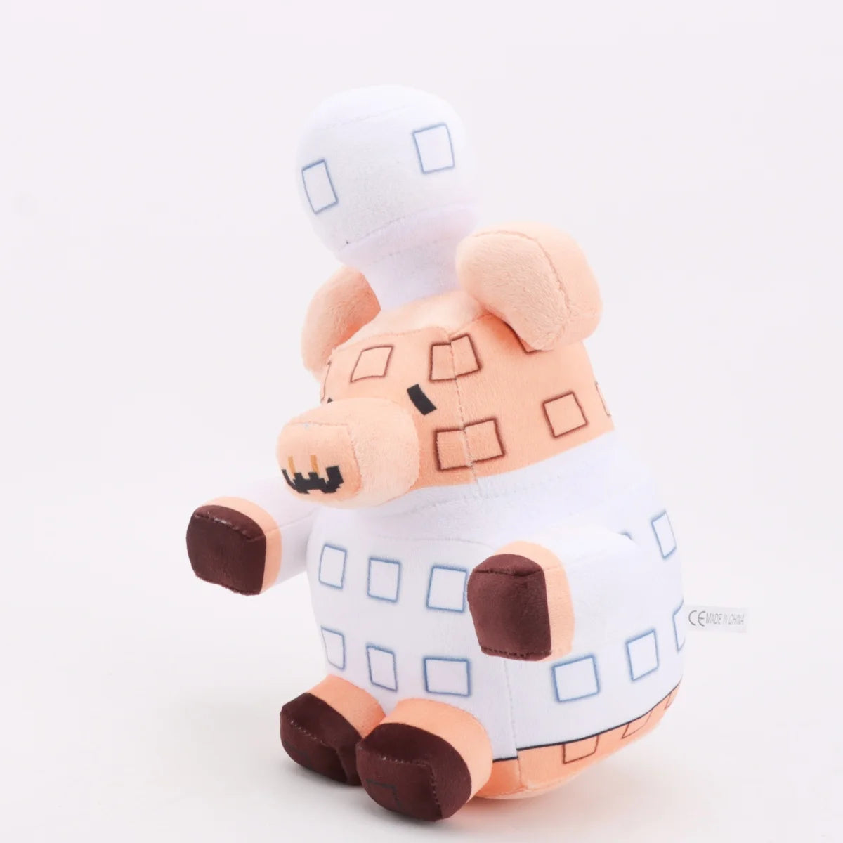 シェフ帽をかぶったワッフル豚のブロック風ぬいぐるみ