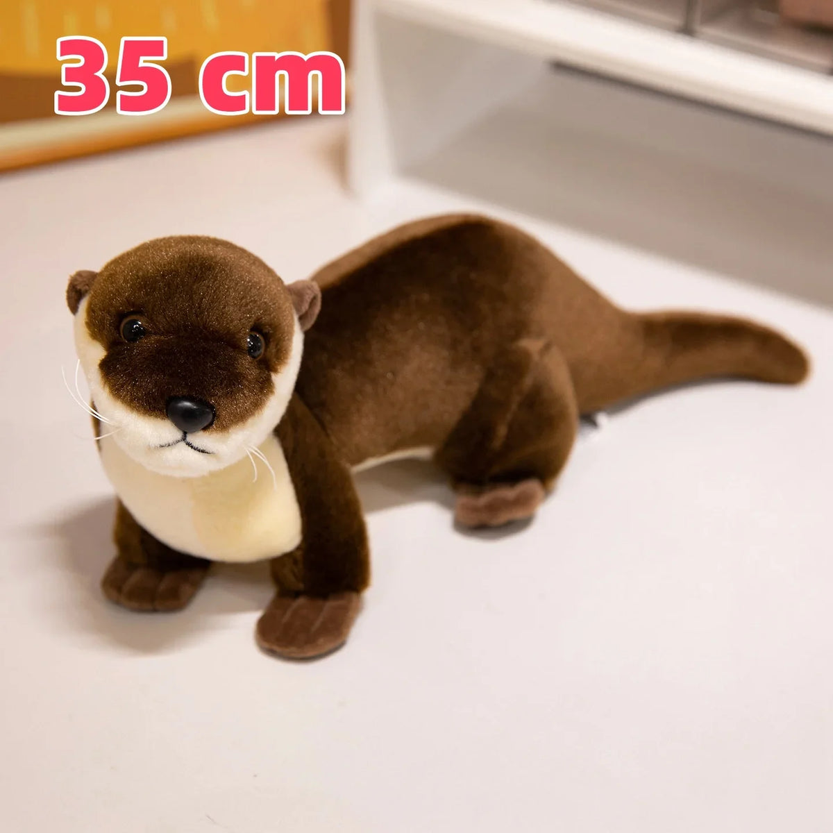 カワウソ ぬいぐるみ 青い魚を抱っこした可愛いマスコット