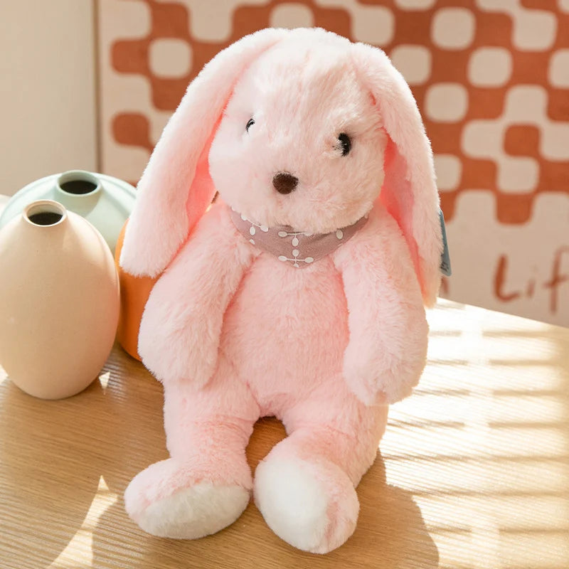 ふわふわセーターを着た垂れ耳うさぎのぬいぐるみ