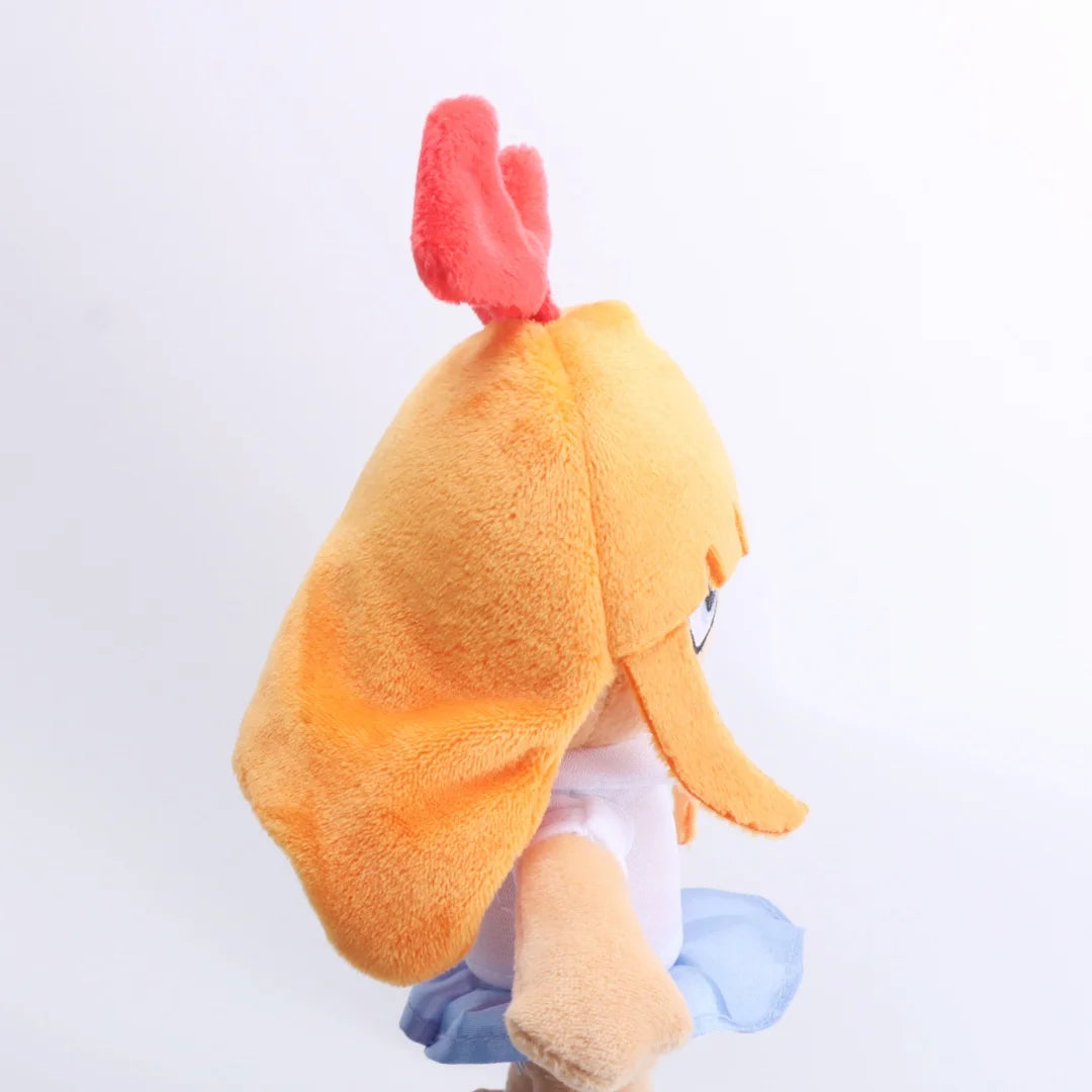 赤いリボンと青い目のオレンジ髪の女の子ぬいぐるみ