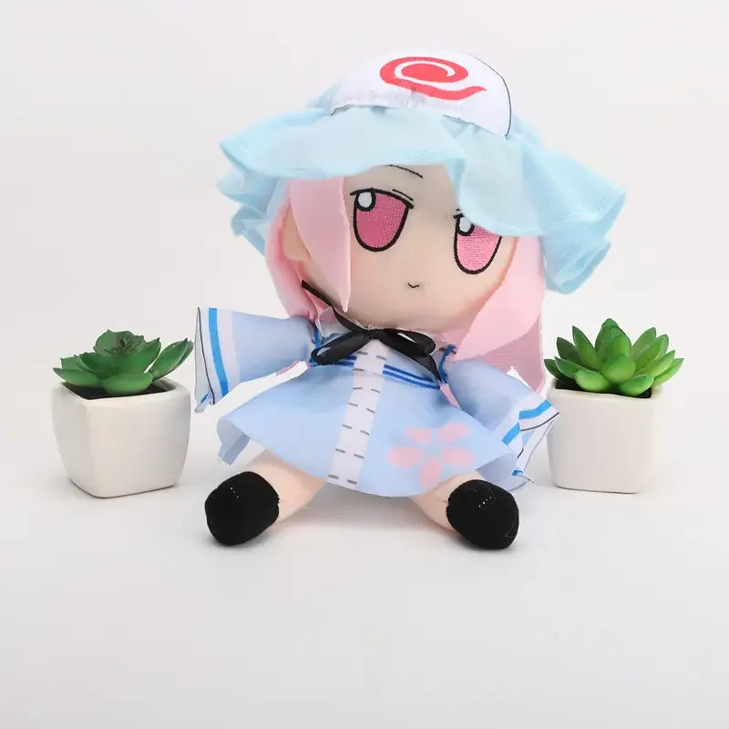 水色のフリル帽子と桜模様ドレスのデフォルメぬいぐるみ