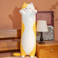 長くて柔らかく、抱き心地の良い猫のぬいぐるみ。心地よいひとときを演出します。イエロー。The Plush Company
