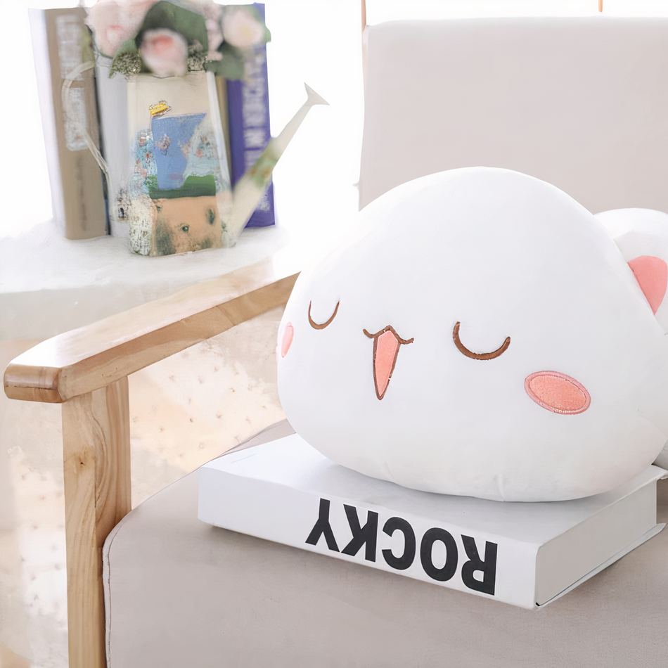 舌を出した可愛いぬいぐるみ猫。柔らかくて白い。お子様の遊びにぴったり。Plush Company