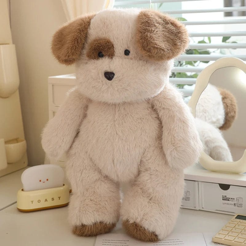 ベージュと茶色の毛皮のぬいぐるみ犬