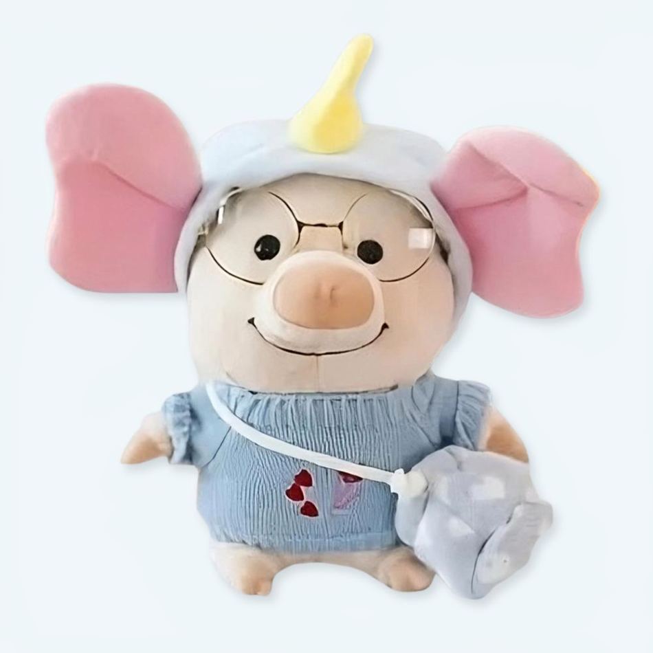象の格好をしたぬいぐるみの豚。子供にぴったりの柔らかくて抱き心地の良いぬいぐるみ。The Plush Company