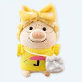 柔らかくて抱き心地の良い黄色のセーターを着た、かわいいぬいぐるみのブタ。The Plush Company