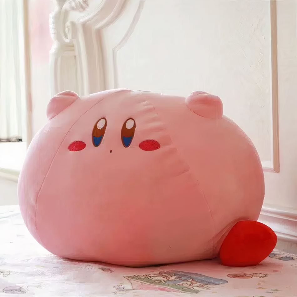 ほっぺがバラ色の可愛いピンクのカービィぬいぐるみ。お子様へのプレゼントに最適です。サイズ：24cm x 18cm。The Plush Company