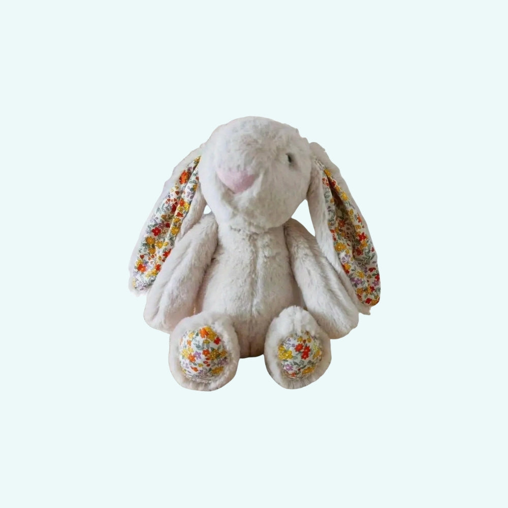 春らしい、花の耳がついた柔らかいウサギのぬいぐるみ。お子様向け。Plush Company