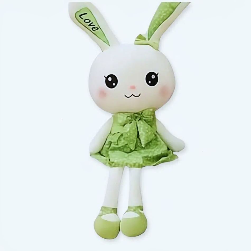 柔らかい緑のドレスを着た、お子様にぴったりの巨大なぬいぐるみウサギ。The Plush Company