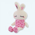 柔らかくて光るピンクのウサギのぬいぐるみ。お子様の夜のお供にぴったりです。Plush Company