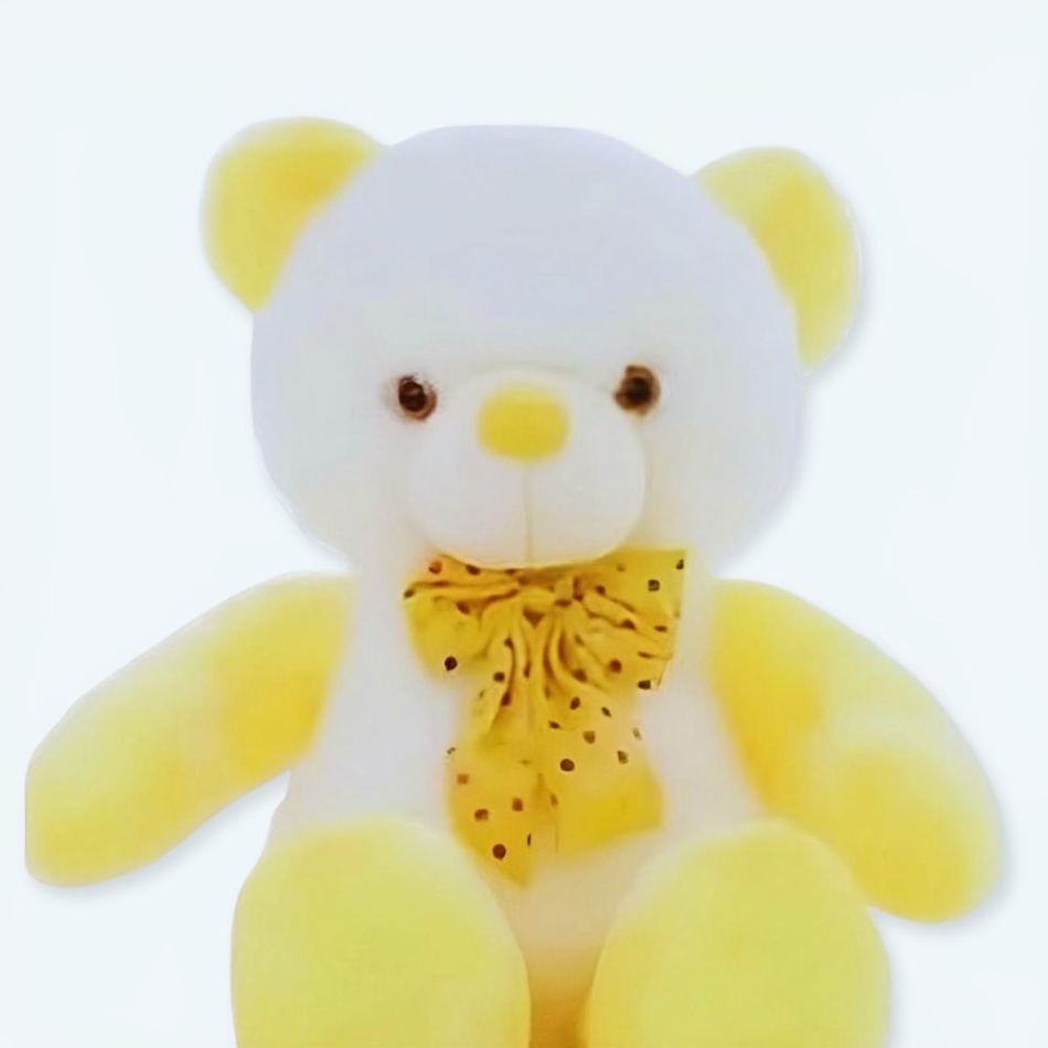 柔らかくて抱きしめたくなる、かわいい黄色のテディベア。お子様のインテリアにぴったりです。 - The Plush Company