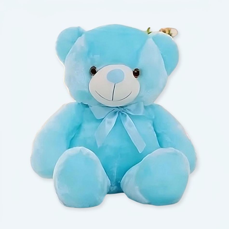 柔らかな青色LEDのテディベア枕は、夜に光ります。The Plush Company