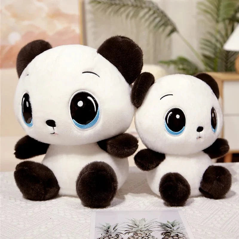 大きな青い目をしたぬいぐるみのパンダ