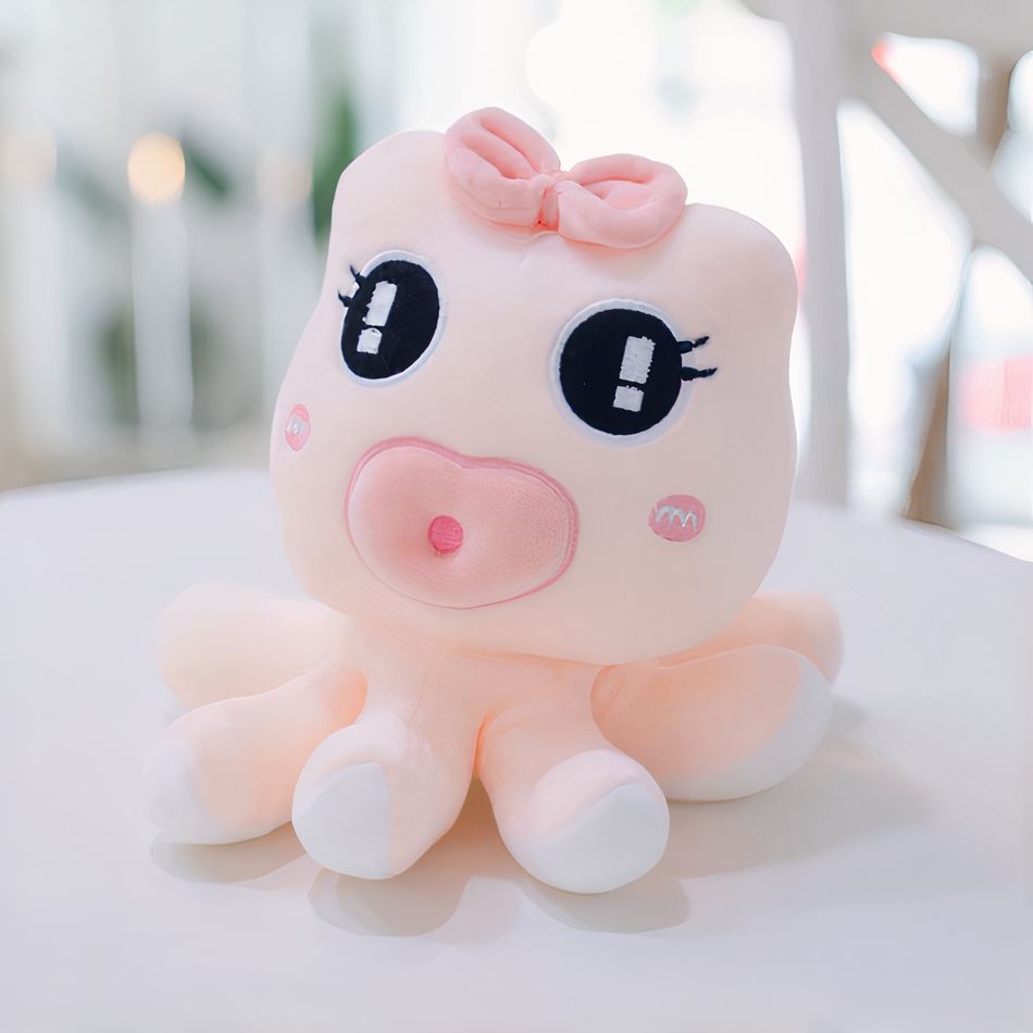 柔らかいピンクの綿のタコの子供用ぬいぐるみ、La Compagnie de la Peluche の海の色のかわいいおもちゃ
