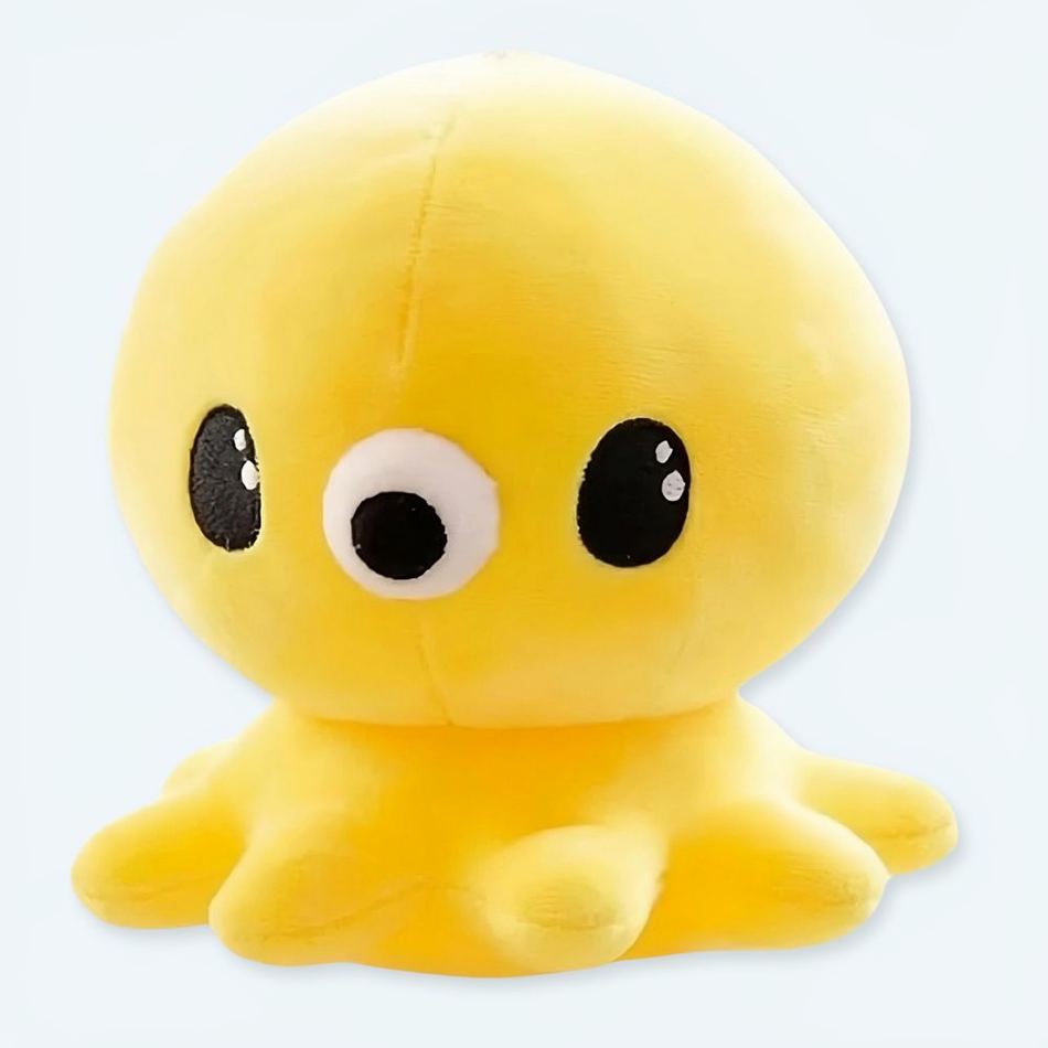 子供部屋にぴったりの、柔らかくて可愛い黄色のタコのぬいぐるみ。The Plush Company