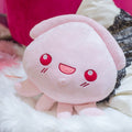 表情豊かなピンクのタコのぬいぐるみ