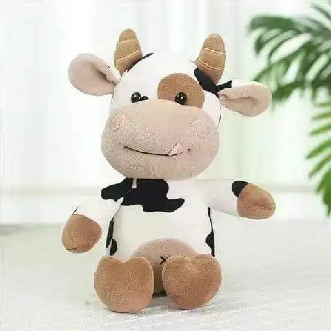 かわいい白い牛のぬいぐるみ